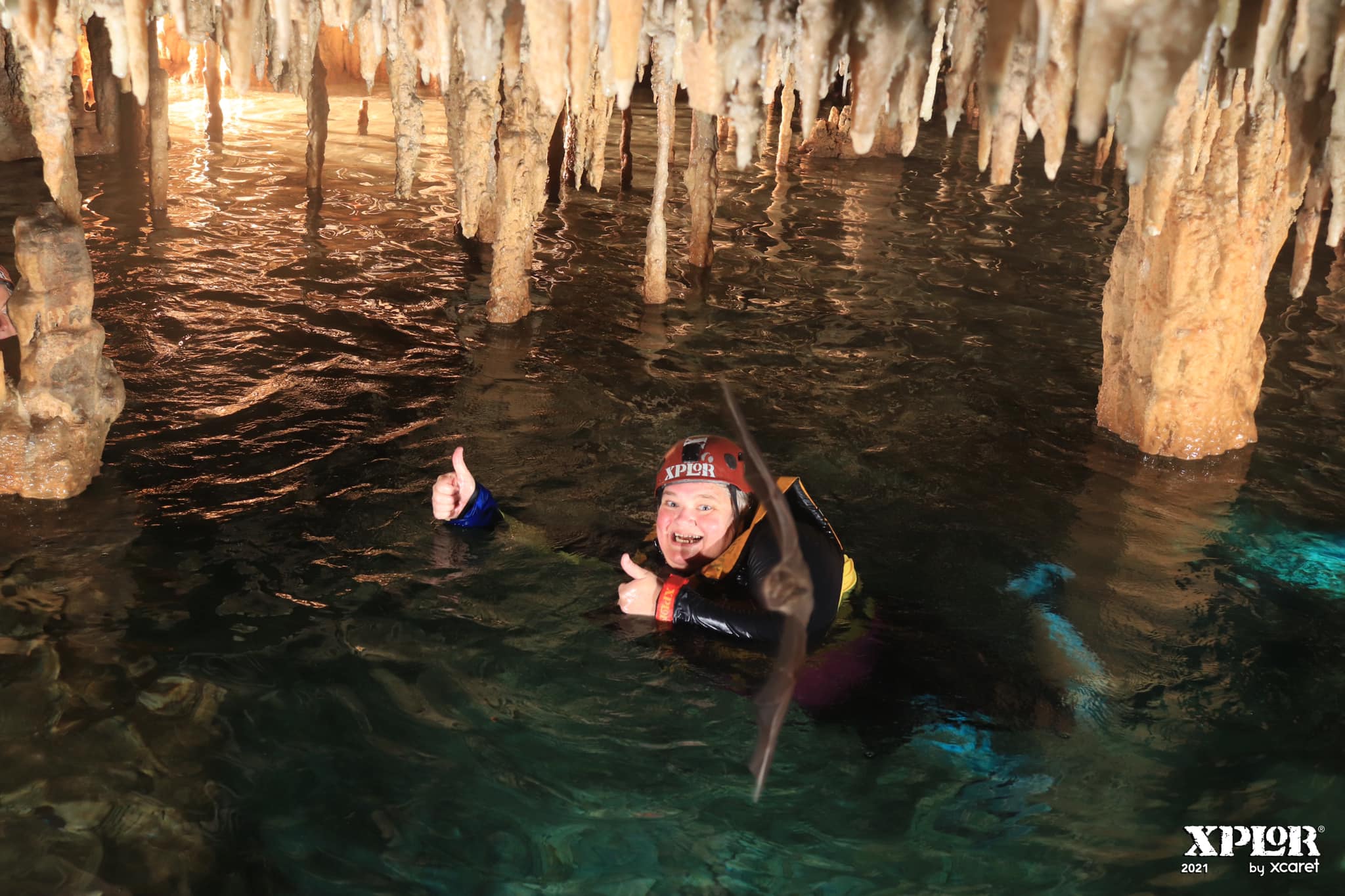 Susan H dives in a cave and a bat flies into the camera frame.